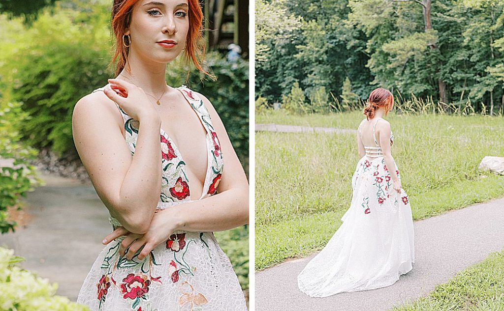 Senior Session of a female with red hair in a long white flower gown 