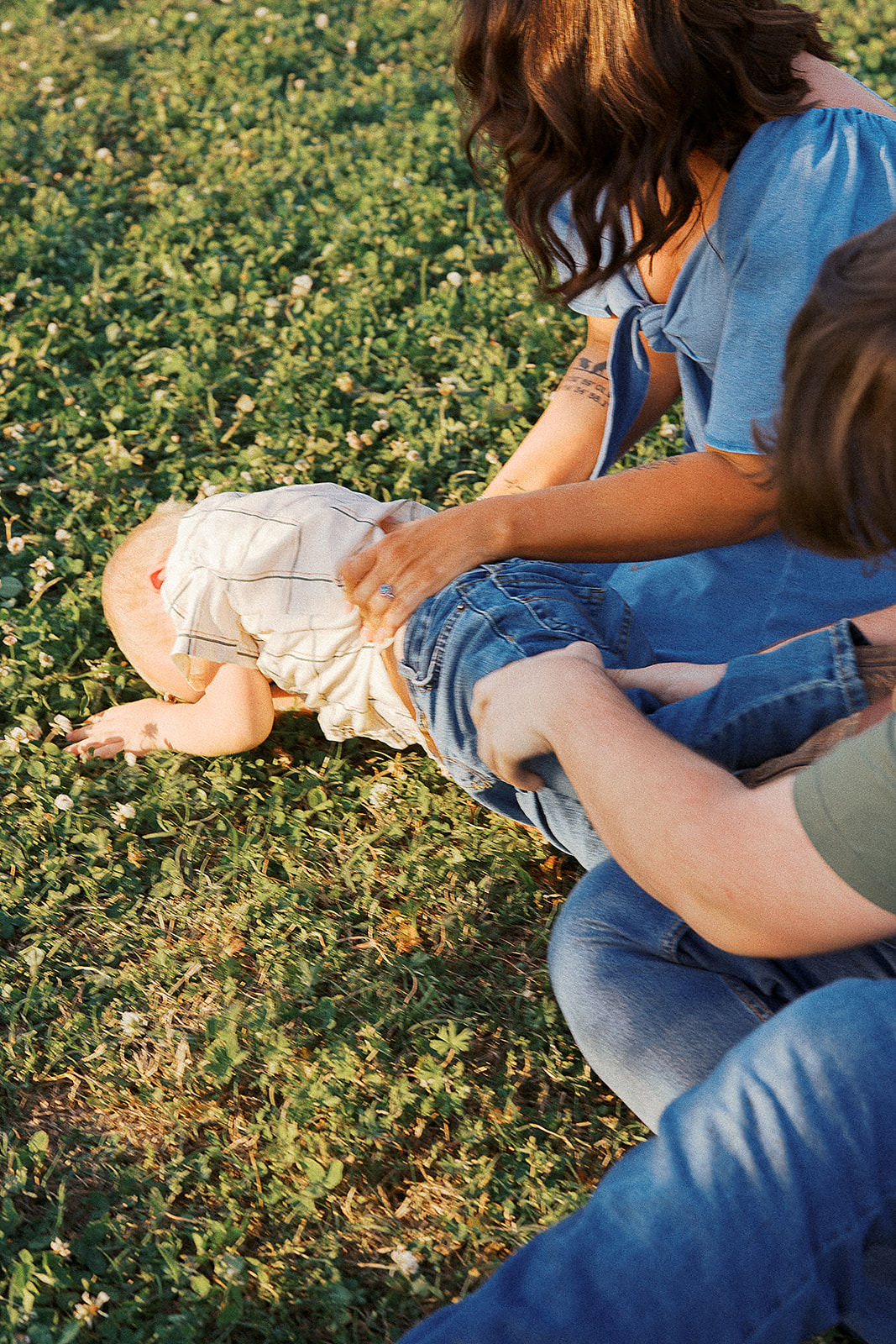 family photo in barnesville showing a family session playing around.